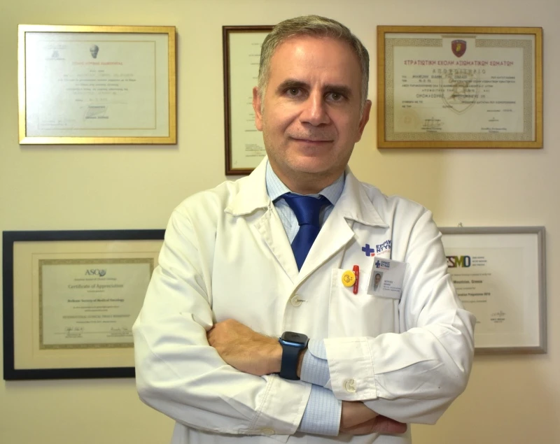 Ιωάννης Μούντζιος, MD, MSc, PhD Παθολόγος Ογκολόγος Διευθυντής της Δ΄ Ογκολογικής Κλινικής και Μονάδας Κλινικών Μελετών στο Νοσοκομείο Ερρίκος Ντυνάν