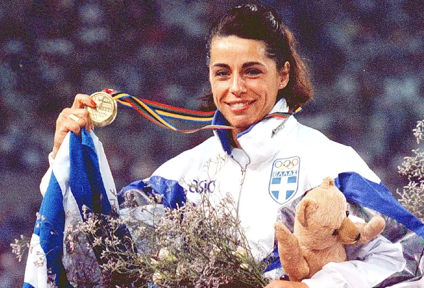 Στο βάθρο με το χρυσό ολυμπιακό μετάλλιο