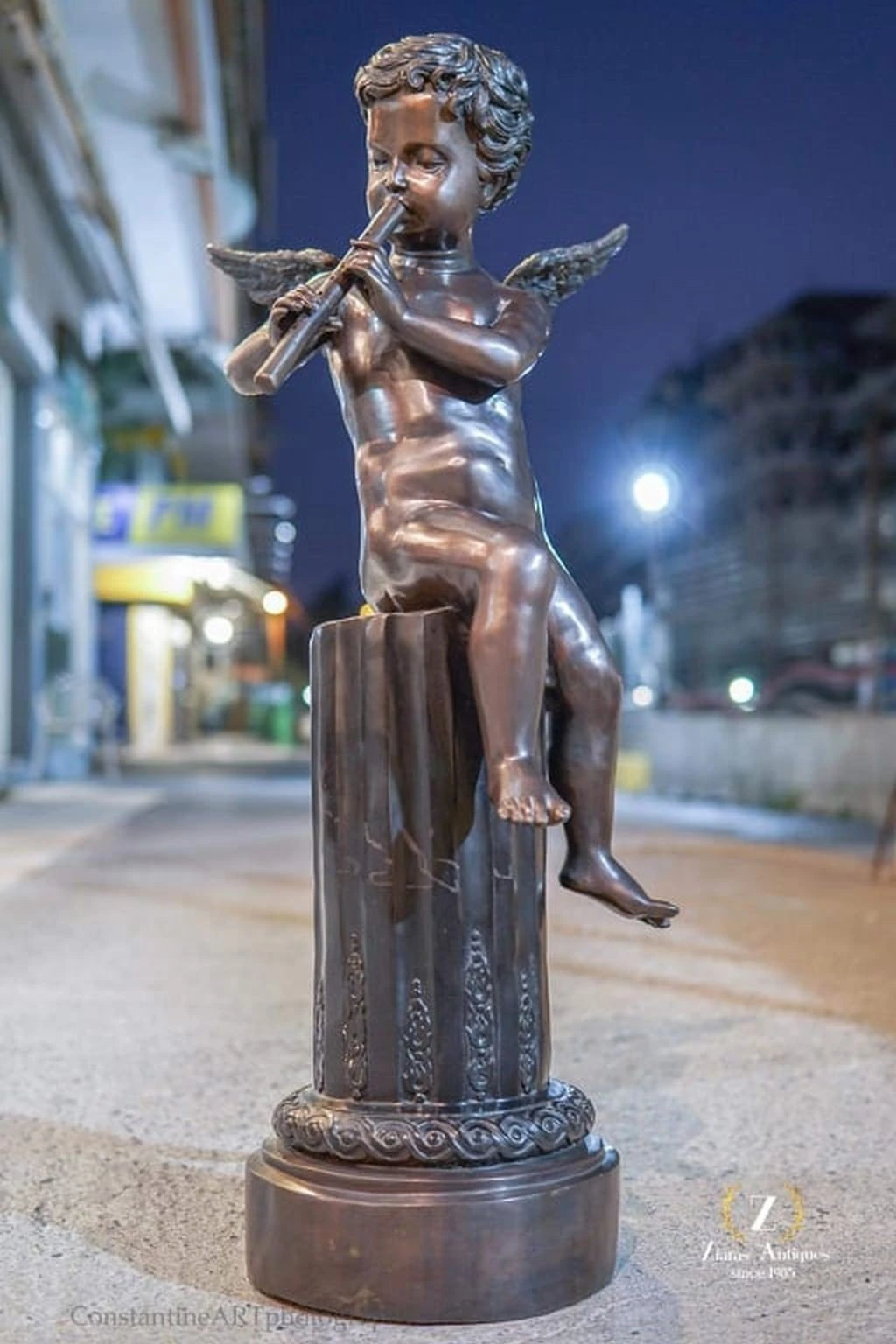 angel-with-flute-j-daste-antique-sculpture-antigrafi.jpg
